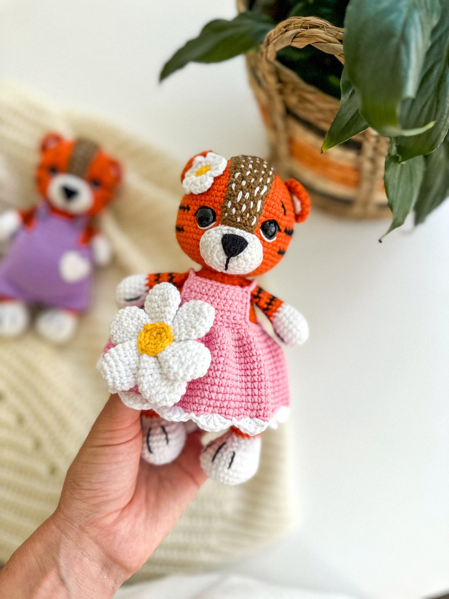 Handmade crochet tiger girl in a pink dress – soft amigurumi baby toy with hypoallergenic filling