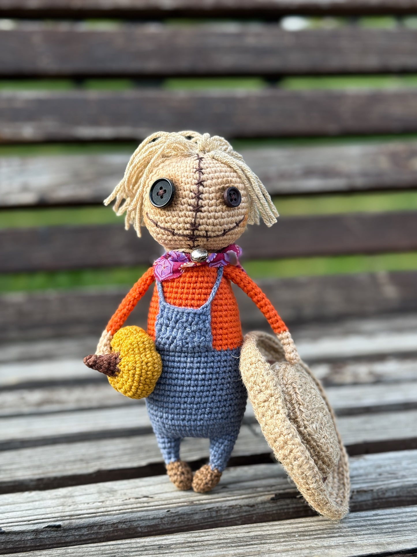 Handmade crochet scarecrow plush with pumpkin – rustic fall and Halloween amigurumi decor