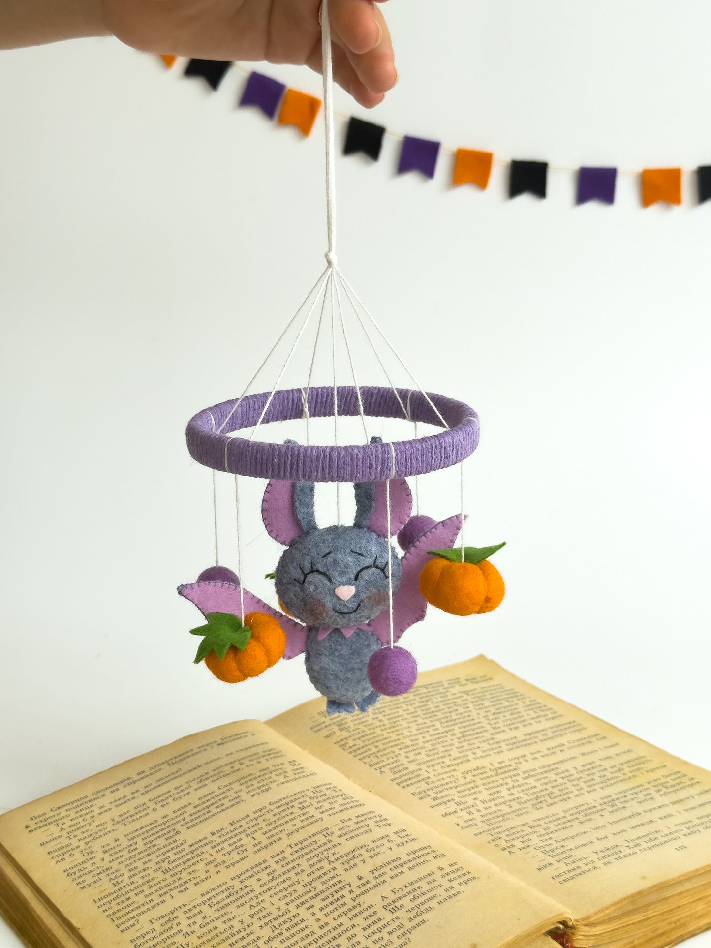 Spooky cute bat crib mobile decor in purple and orange