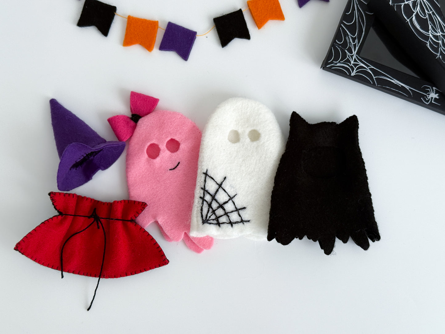 Handmade felt Halloween costumes for ghost toy – witch dress, Dracula cape, and bow outfit