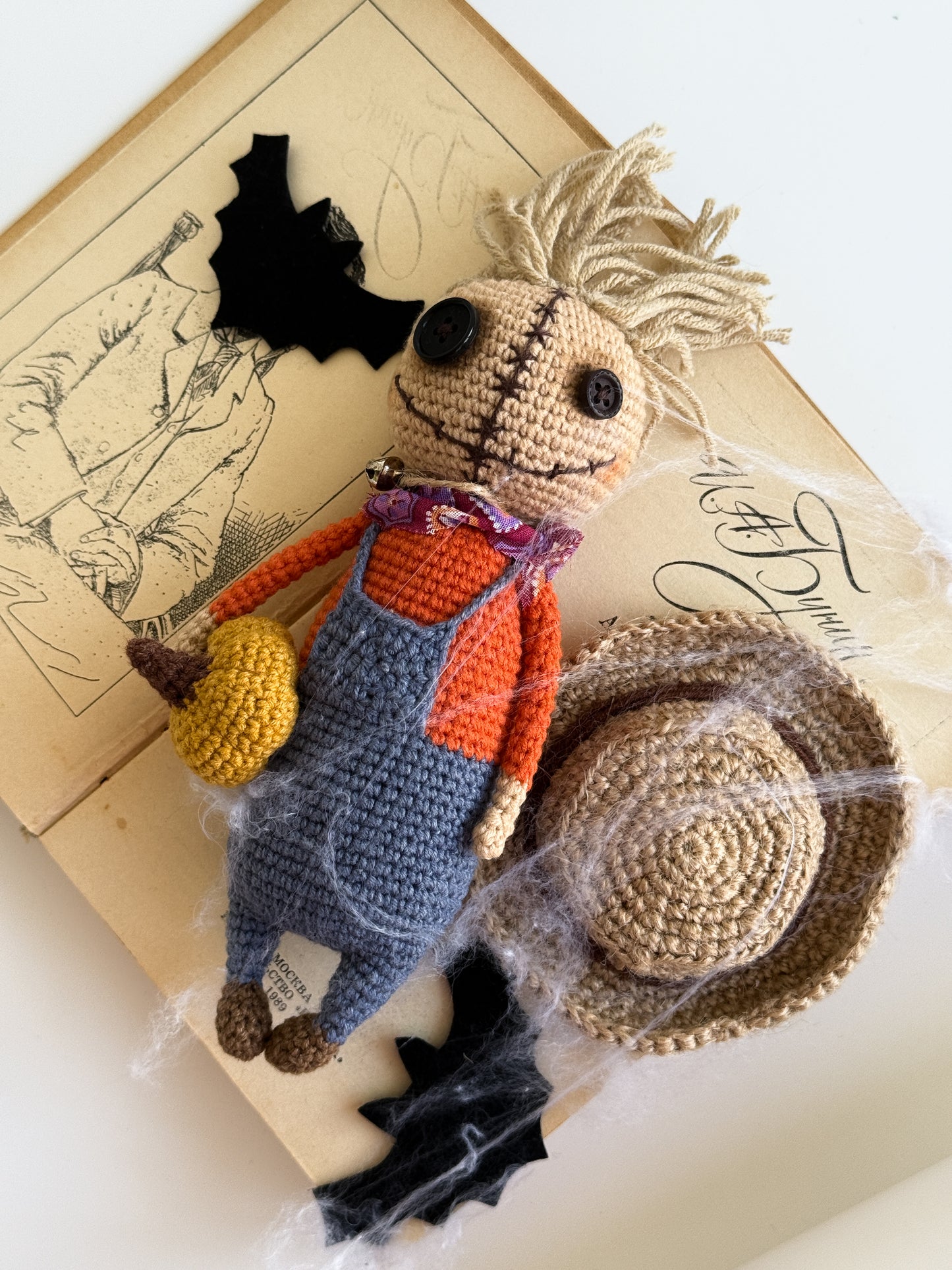 Fall harvest crochet doll with orange shirt and blue overalls
