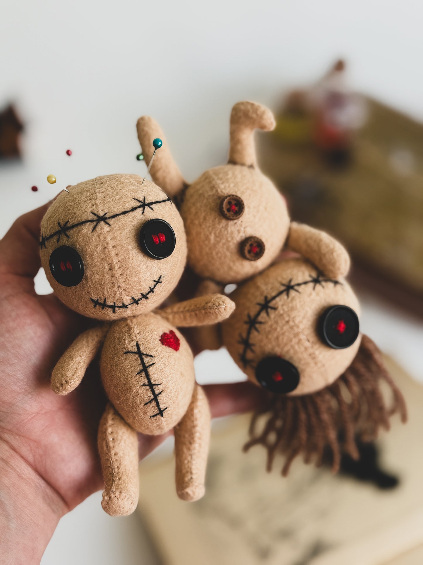 Gothic voodoo doll couple handmade from felt with button eyes and heart