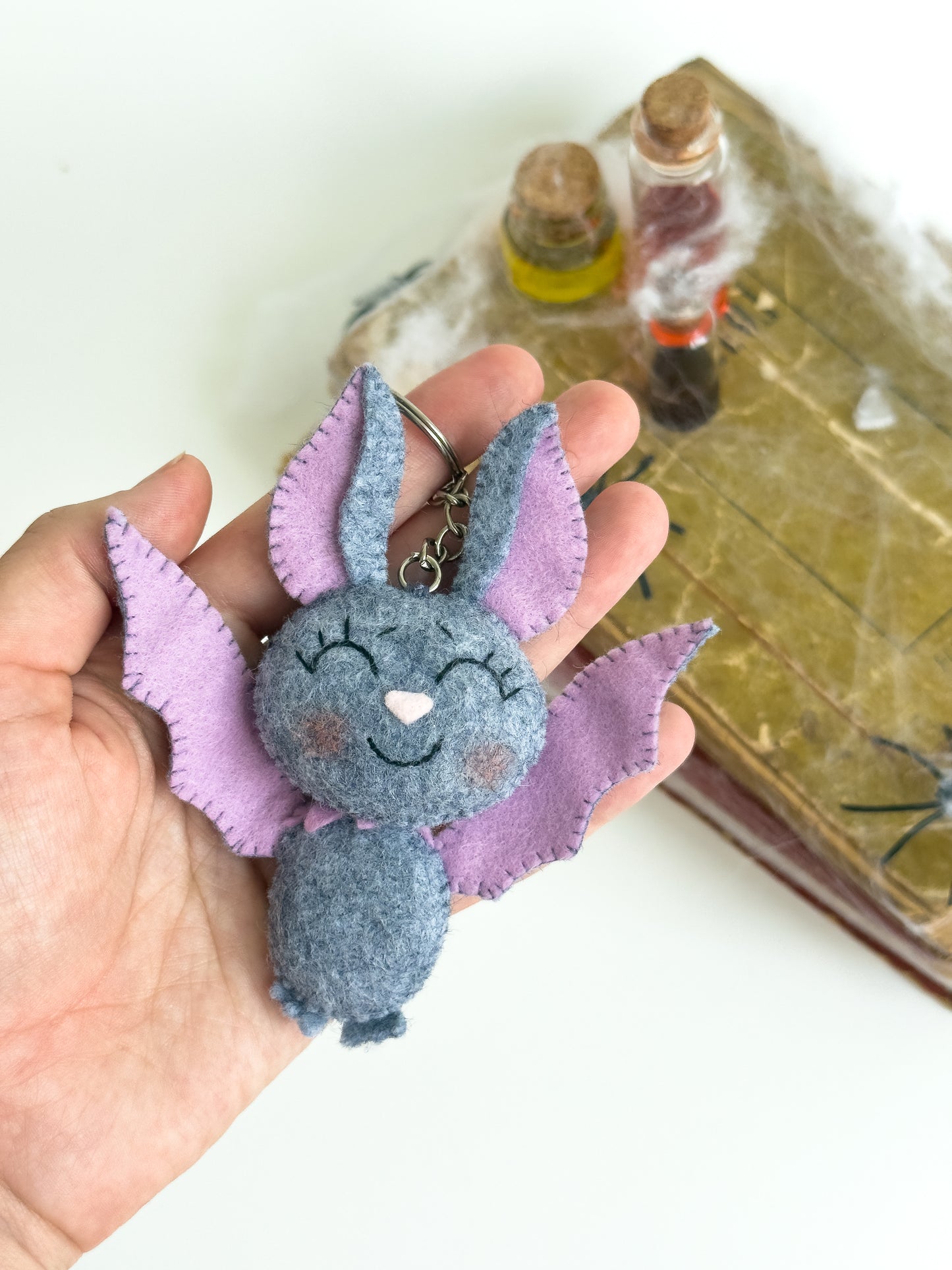 Small spooky bat ornament in kawaii style, perfect for Halloween trick-or-treat bags