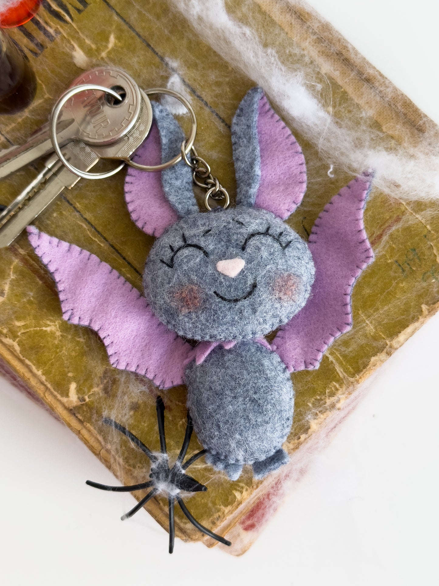 Halloween plush bat keychain used as a bag charm or key ring, soft and handmade