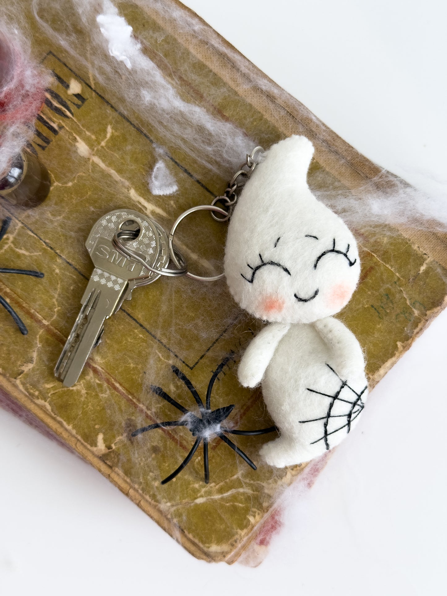 Soft white felt ghost accessory for spooky season
