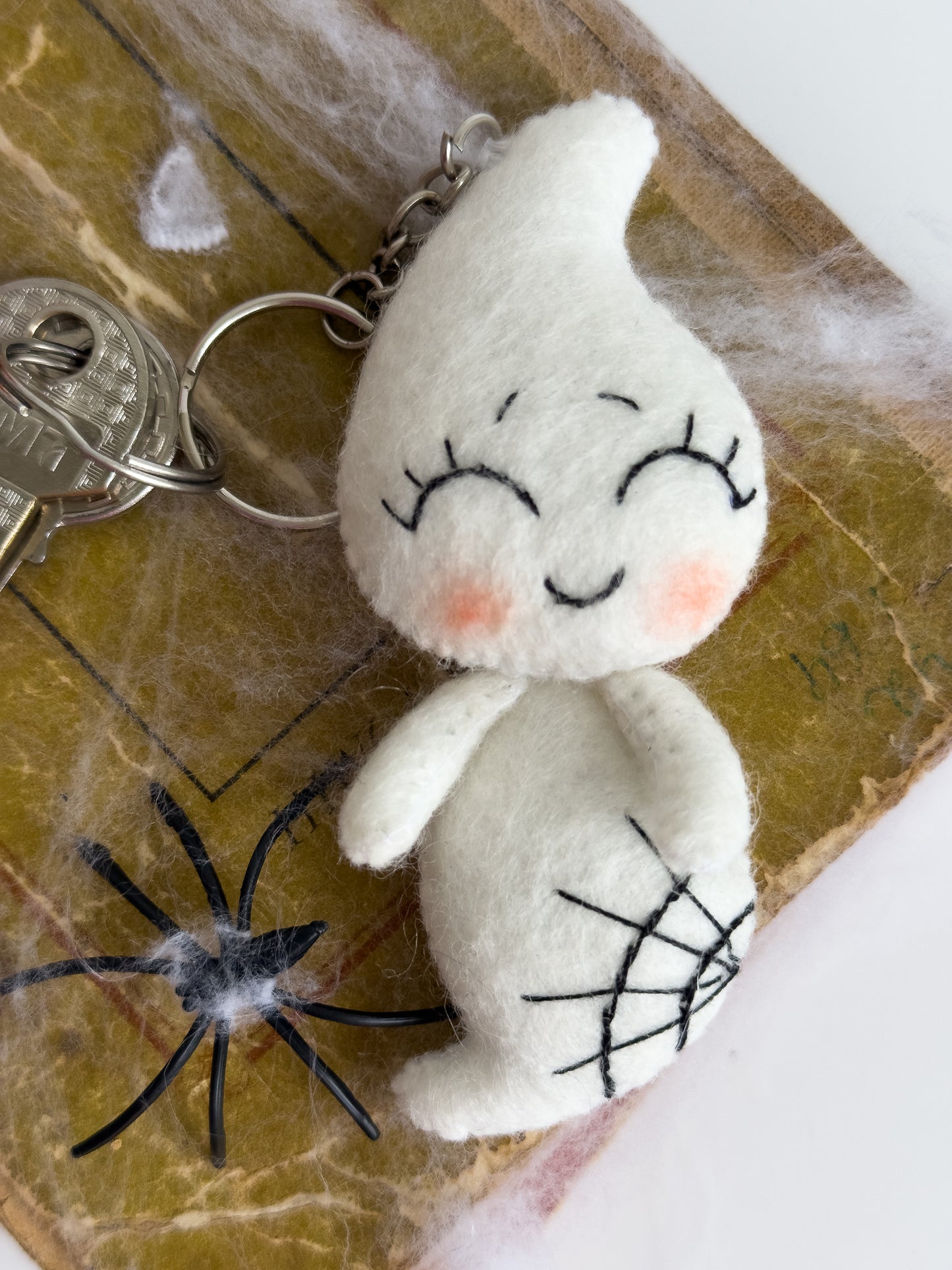 Soft white felt ghost accessory for spooky season