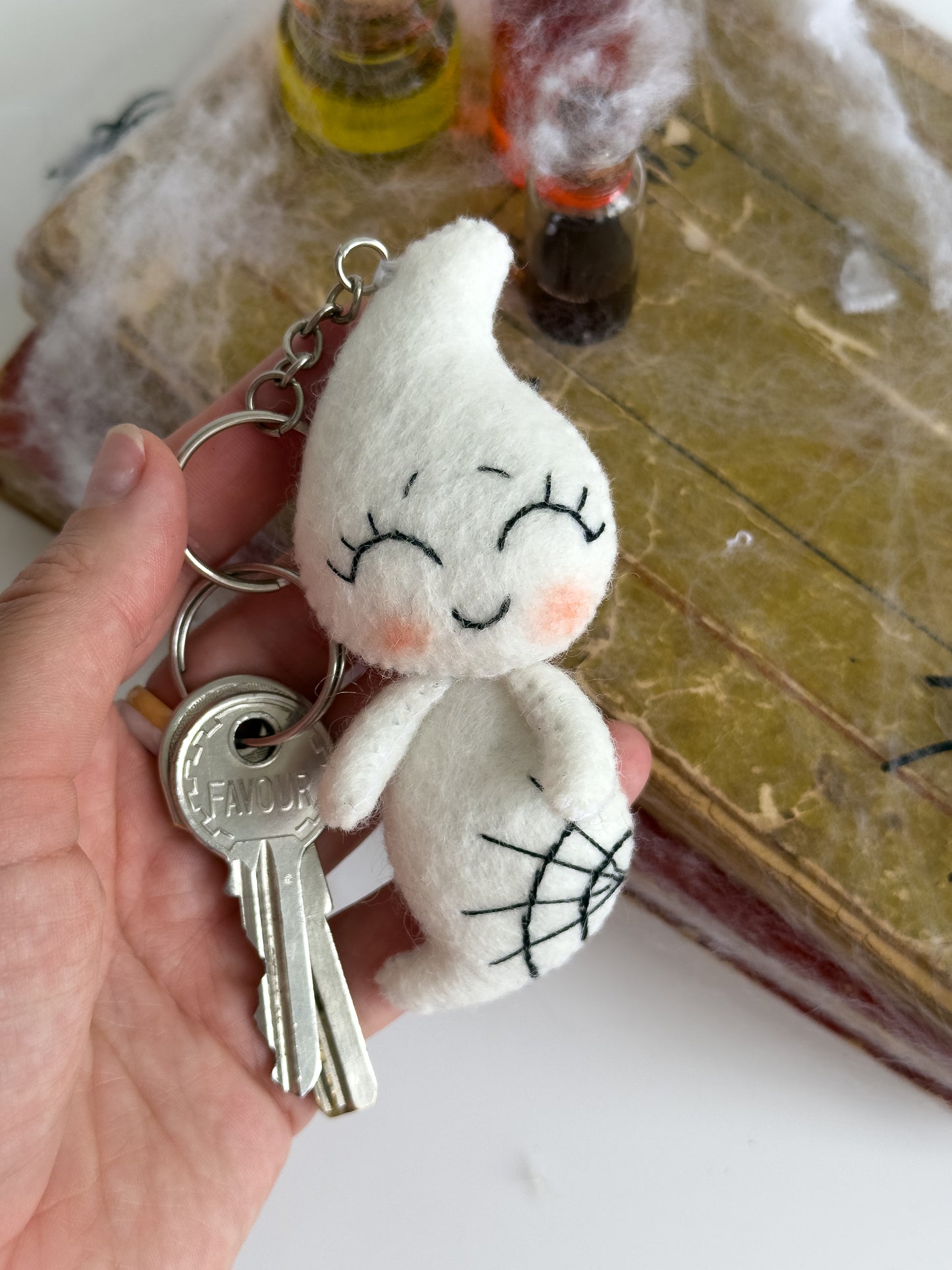 Close-up of Halloween plush ghost key ring