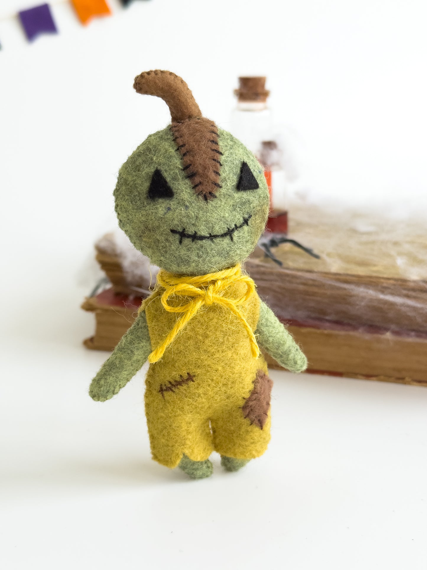 Pumpkin boy plush in orange costume – handmade fall toy