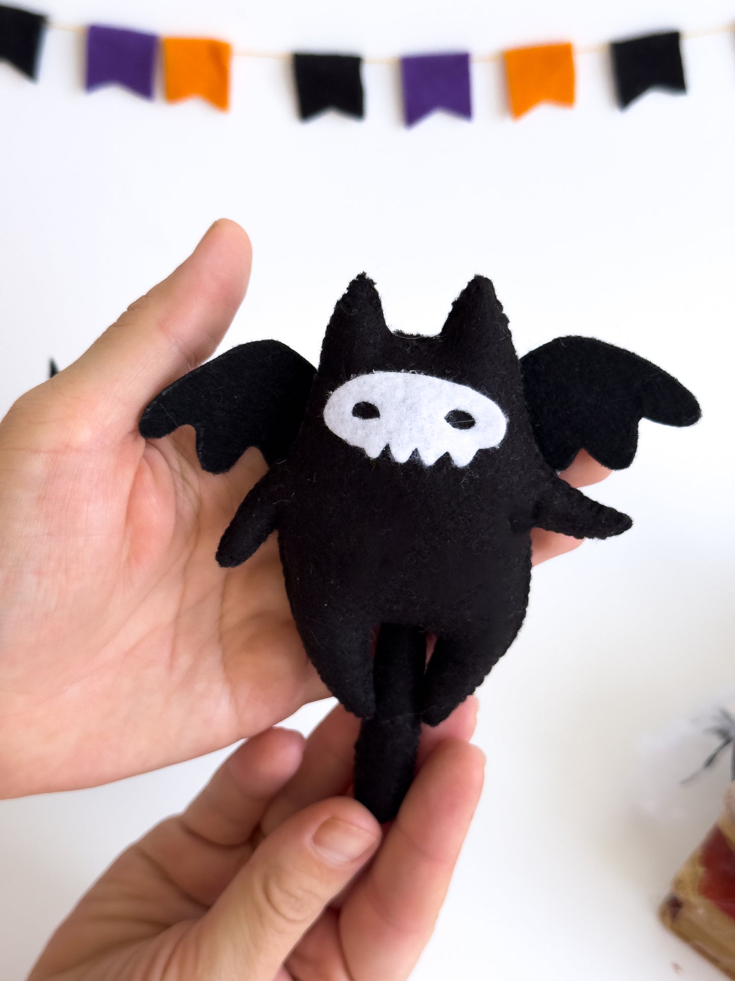Handmade black cat plush with skull mask and wings
