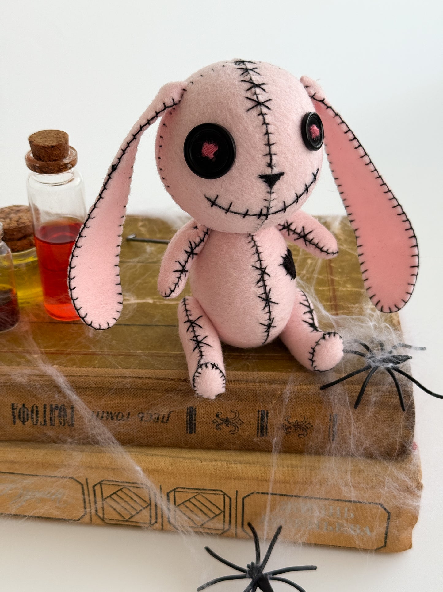 Handmade pink bunny plush with button eyes