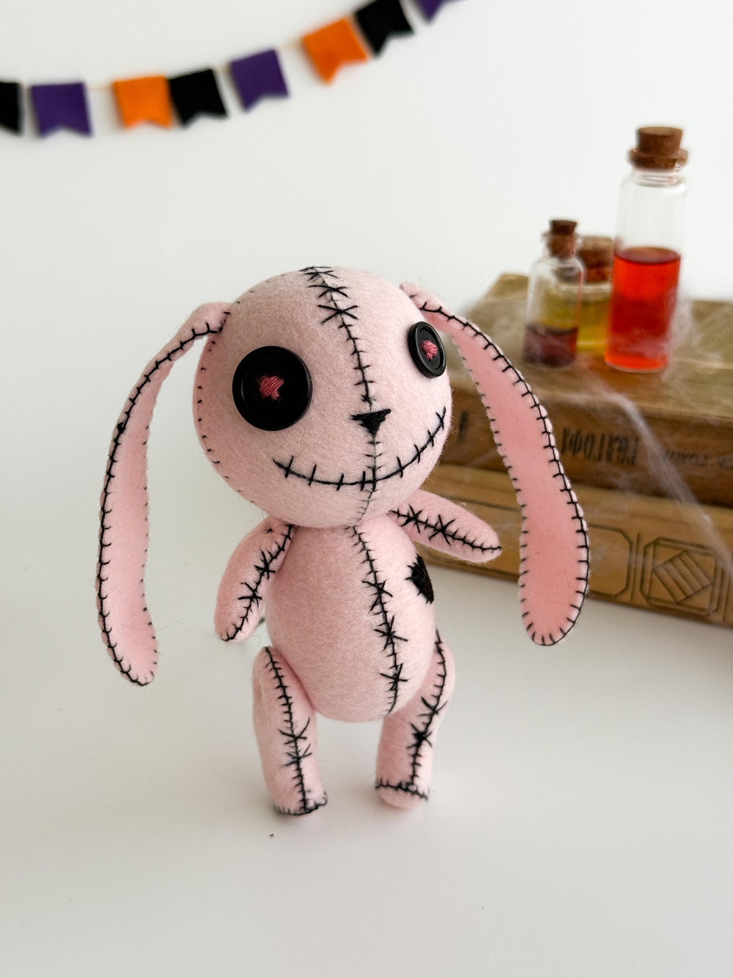 Handmade pink bunny plush with button eyes
