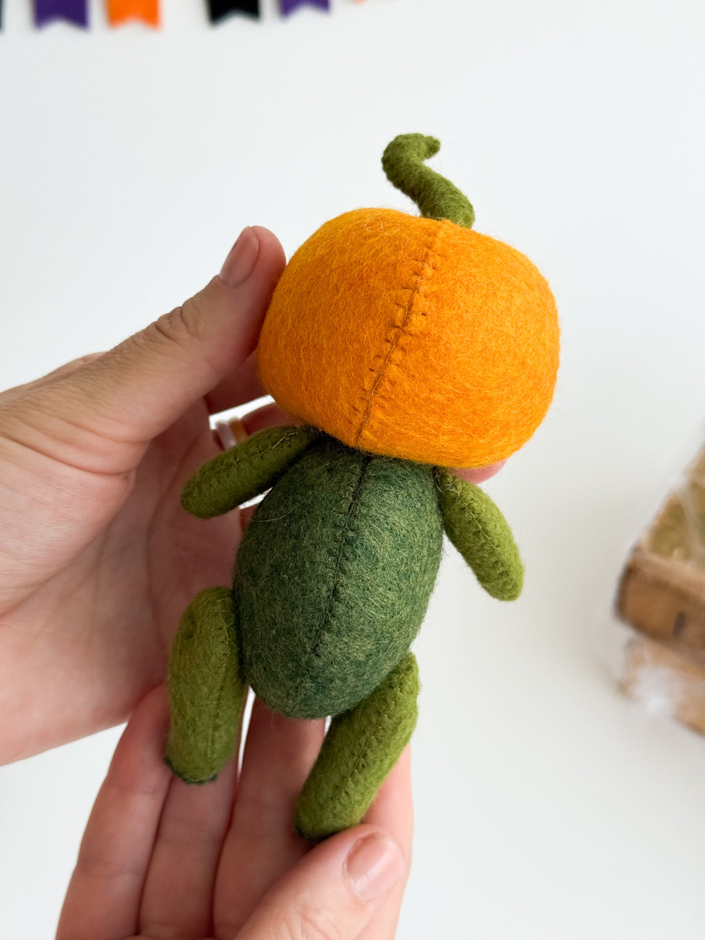Handmade spooky cute pumpkin plush with button eyes
