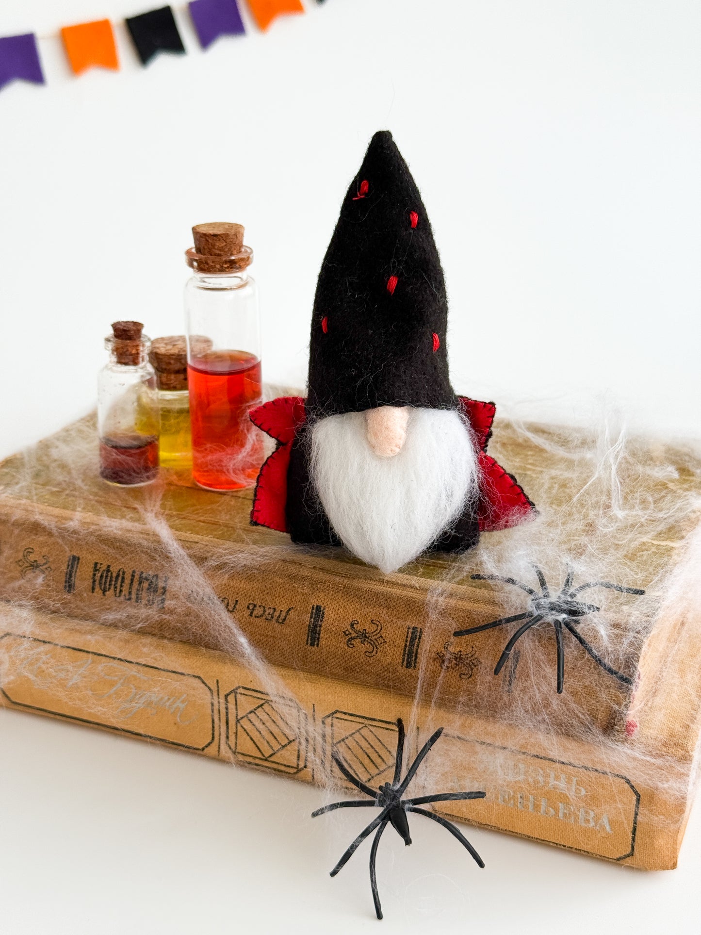 Black felt Halloween gnome with red cape and white beard