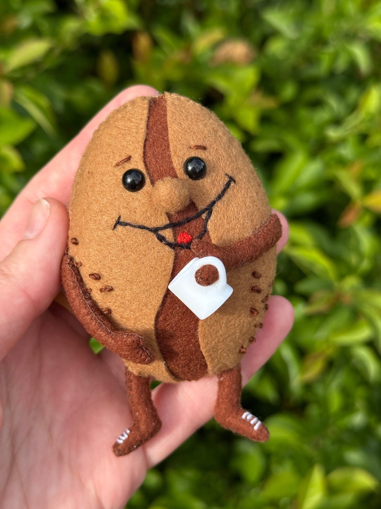 Smiling Felt Coffee Bean Plush Toy with Tiny Cup – Handmade Gift for Coffee Lovers - WoollyFox