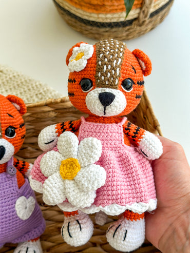 Set of handmade crochet tiger dolls – girl in pink dress and boy in overalls, amigurumi baby toys with cotton yarn