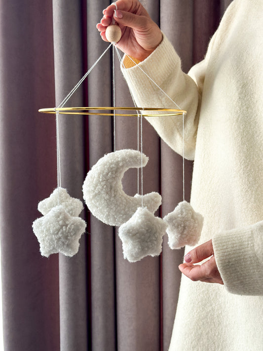 Handmade boucle baby mobile with moon and stars – neutral soft nursery decor