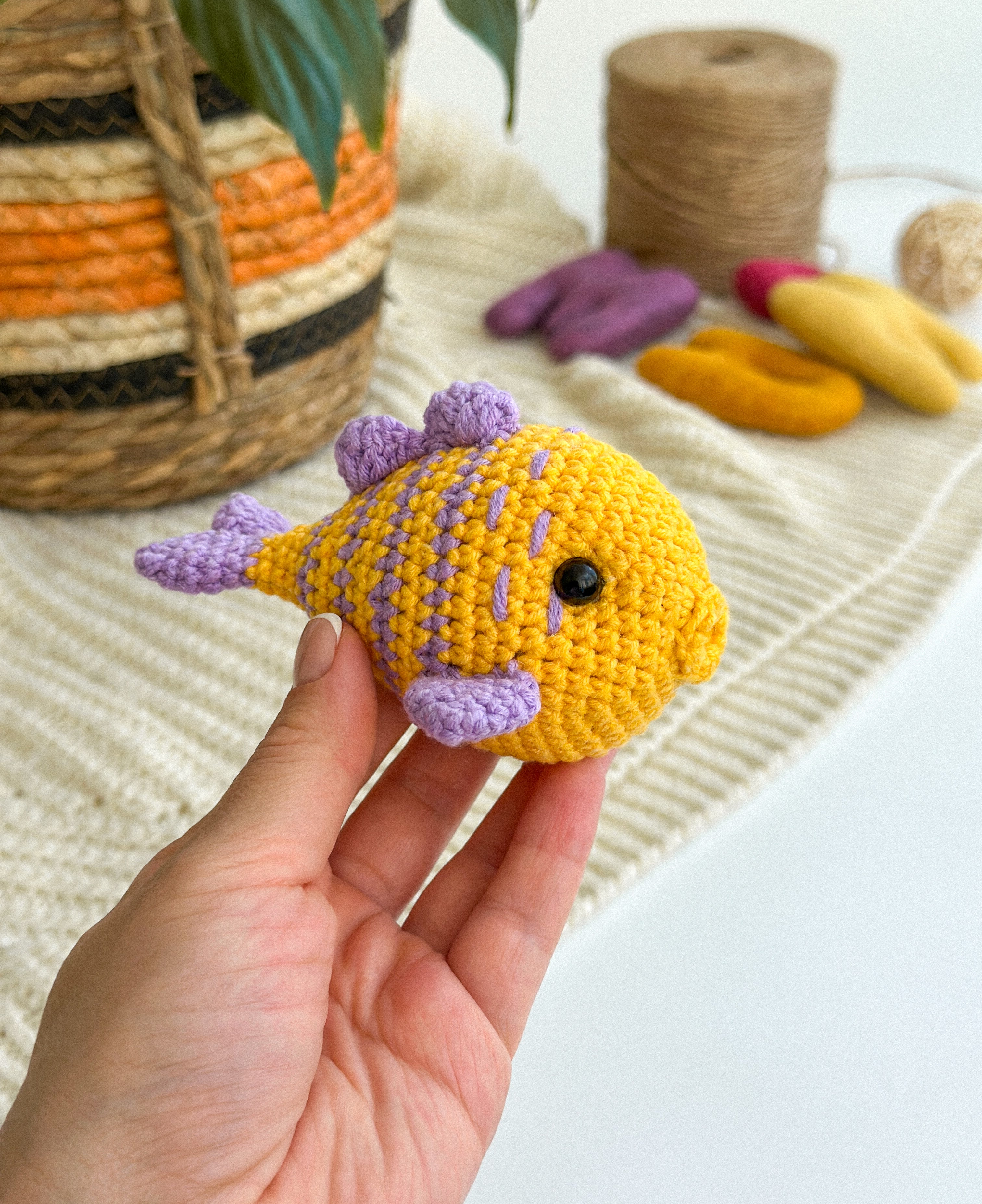 Crochet fish plushie in natural light – soft toy for kids or nursery decor