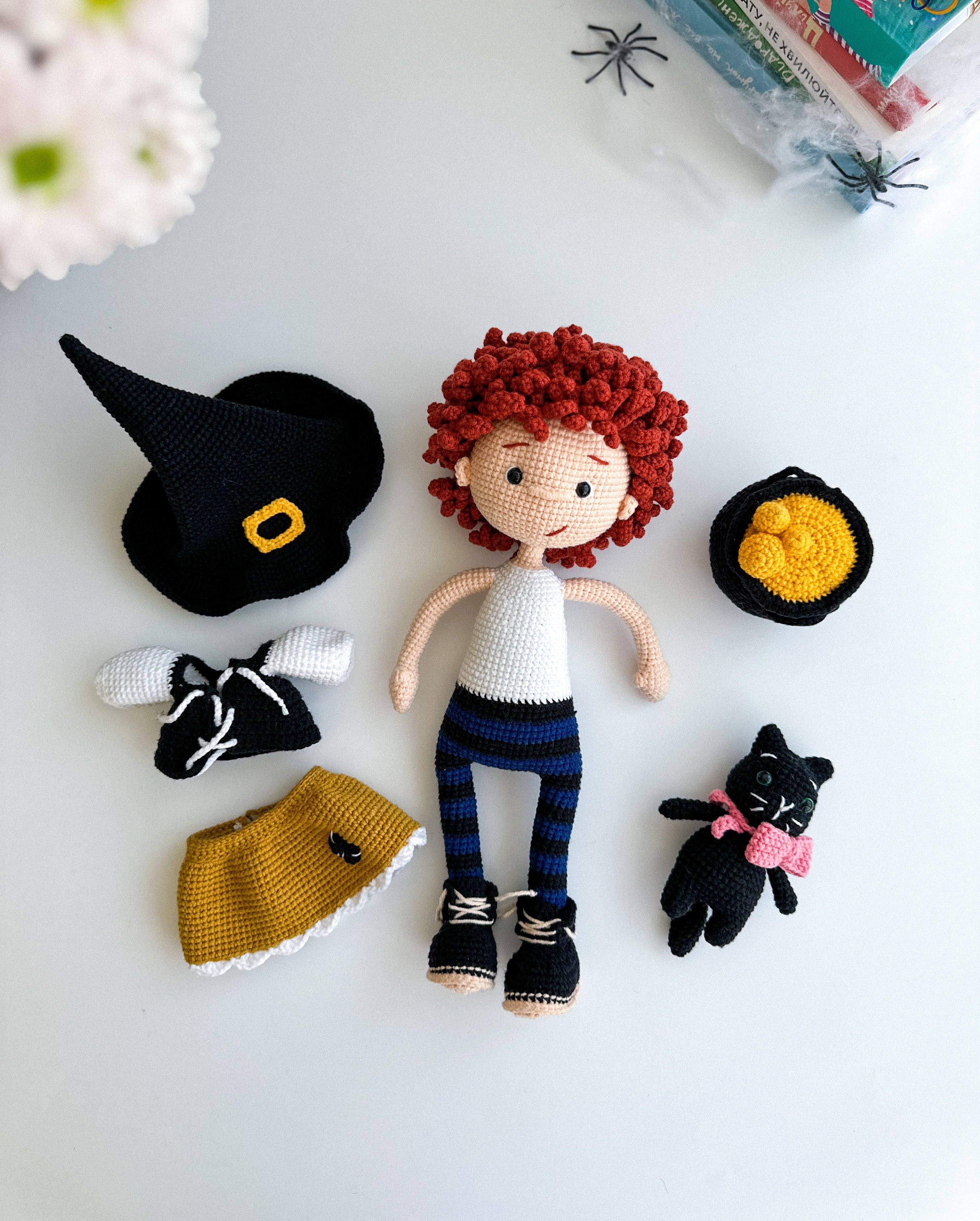 Handmade crochet witch girl doll with black cat and cauldron. Soft amigurumi Halloween gift or decor piece. Cotton yarn, 31×14 cm.