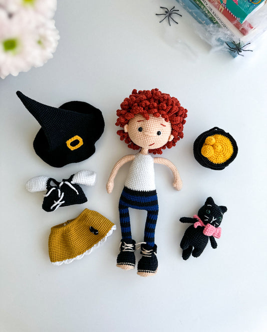Handmade crochet witch girl doll with black cat and cauldron. Soft amigurumi Halloween gift or decor piece. Cotton yarn, 31×14 cm.