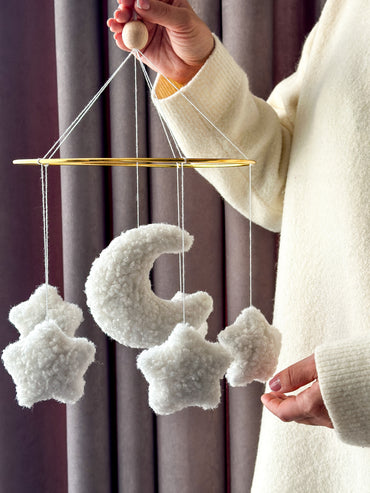 Handmade boucle baby mobile with moon and stars – neutral soft nursery decor