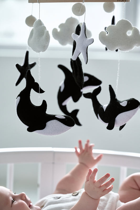 Black and white orca baby mobile with anchor – ocean nursery decor