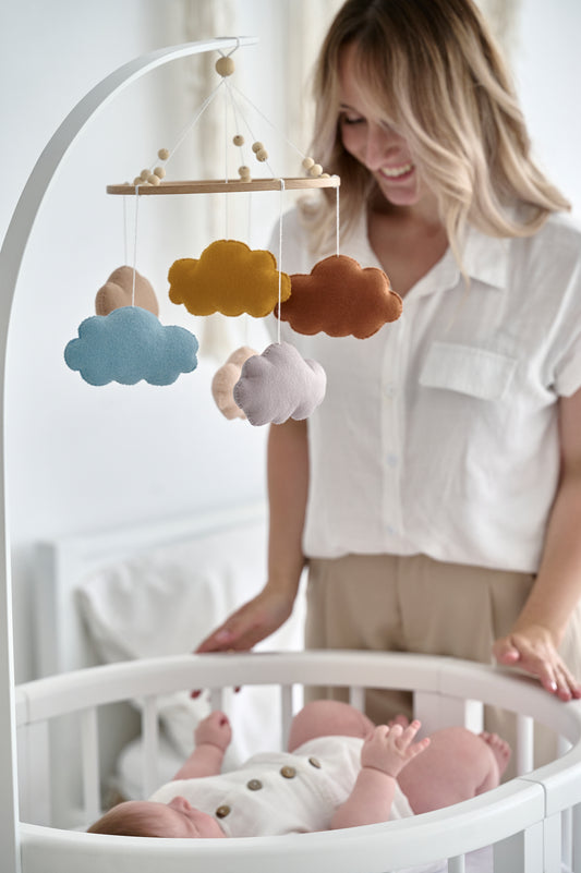 Pastel cloud baby mobile with felt clouds on wooden hoop