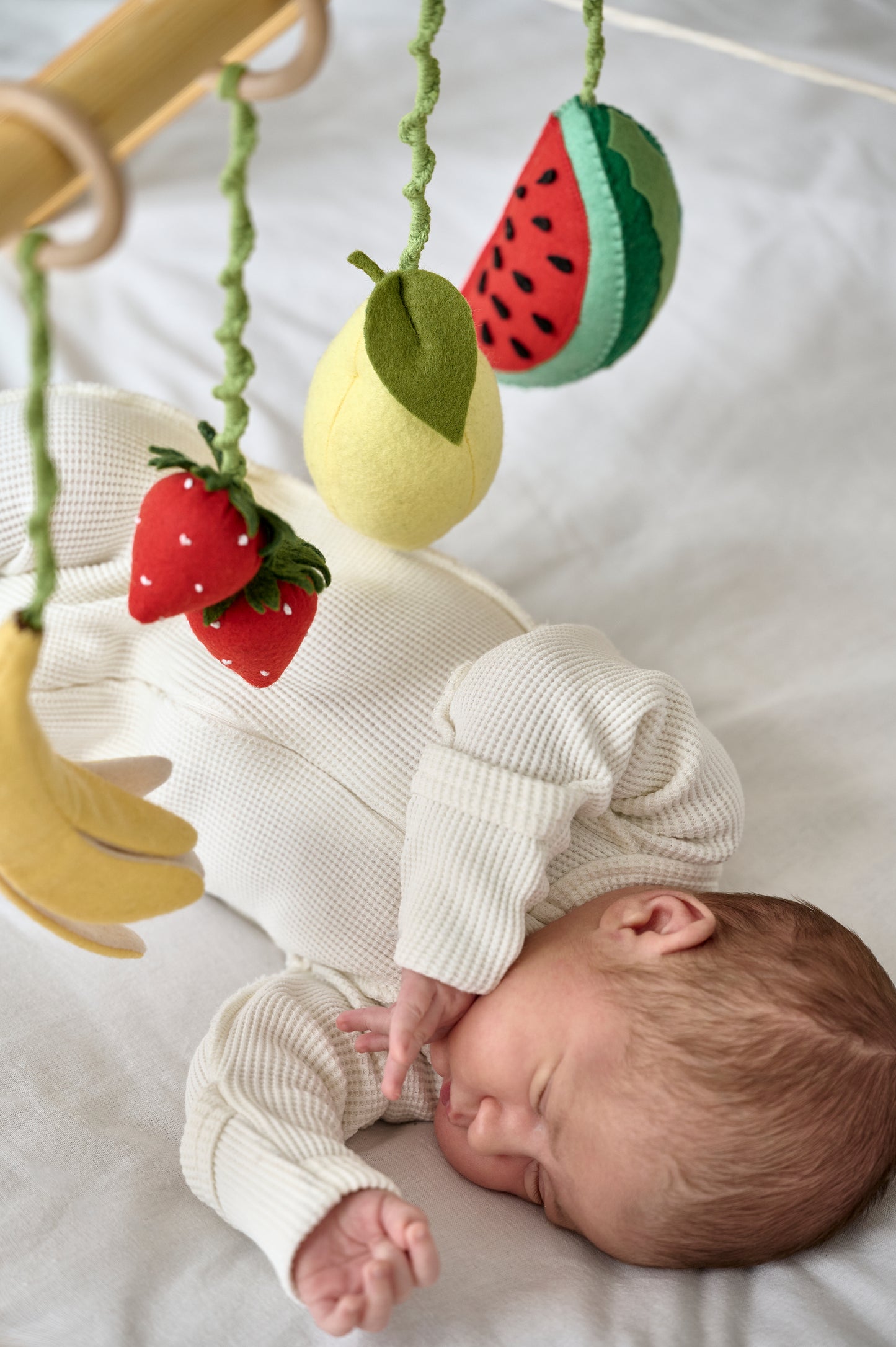 Strawberry, banana, and lemon baby gym hanging toys