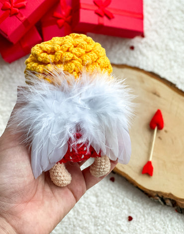 Soft cotton crochet Cupid with real feather details