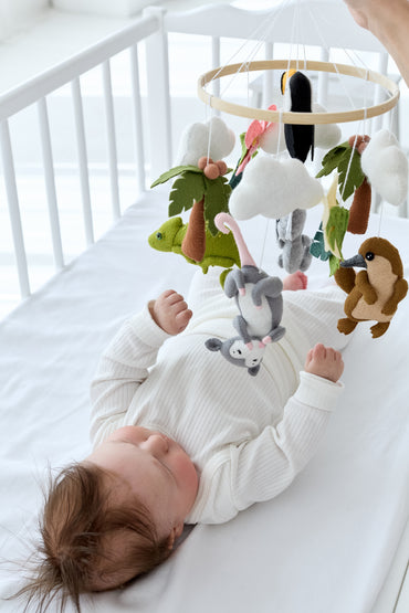 Handmade mobile for baby crib with jungle theme and soft felt animals