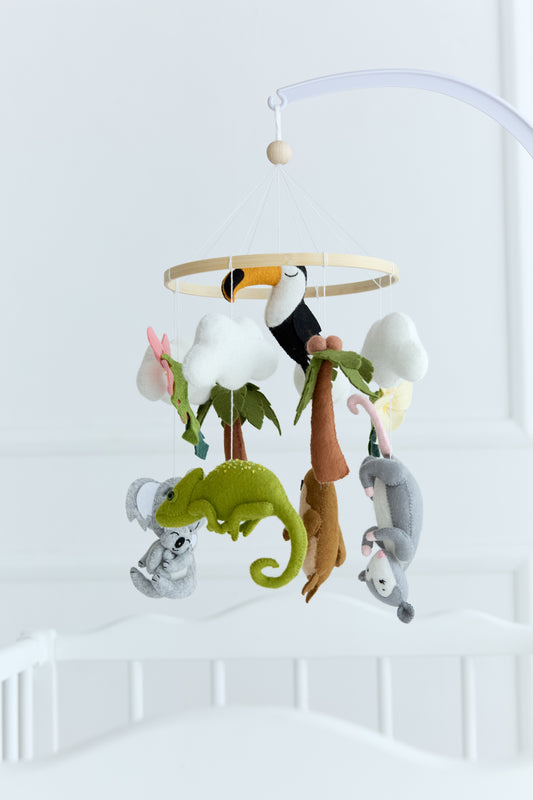 Jungle animal baby mobile featuring koala, chameleon, possum and toucan