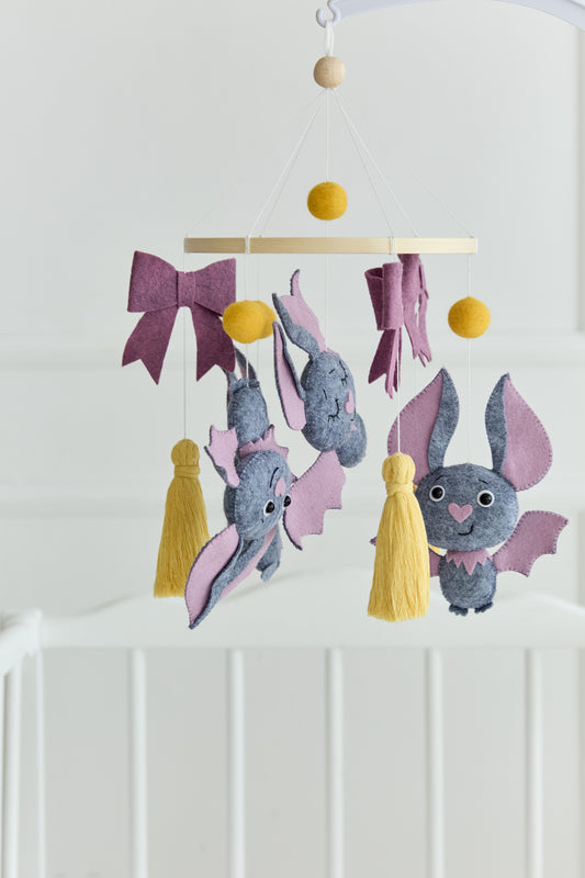 Baby mobile with grey felt bats and bows