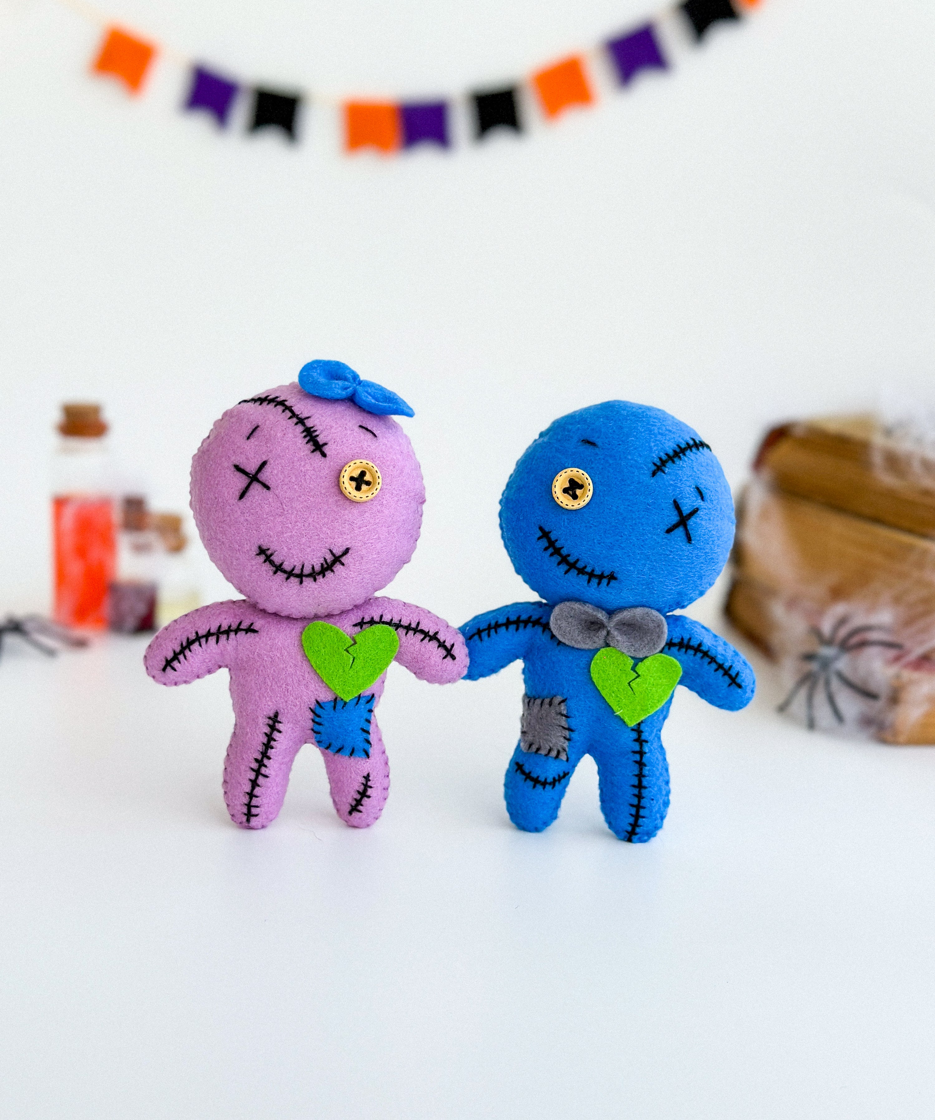 Set of 2 felt zombie dolls – boy and girl with stitched hearts