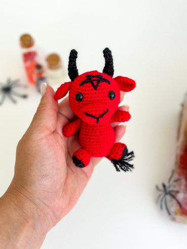 Small crochet Baphomet toy hanging as rearview mirror charm