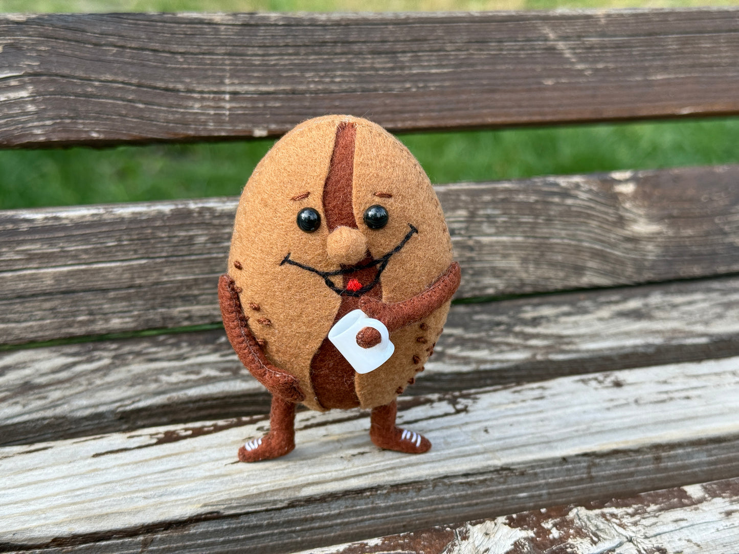 Soft plush coffee bean made of felt with holofiber filling
