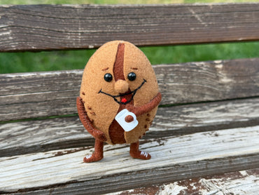 Soft plush coffee bean made of felt with holofiber filling