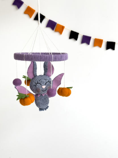 Handmade bat baby mobile with pumpkins and bows for Halloween nursery