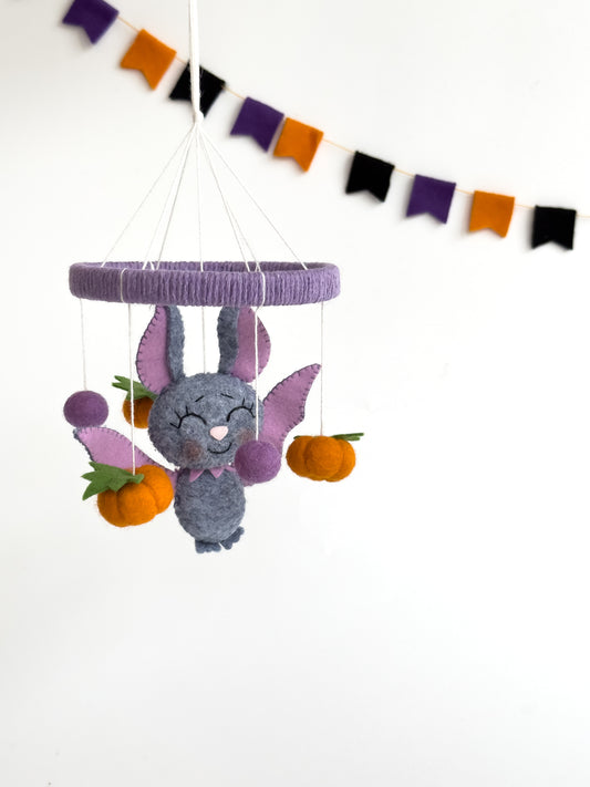 Handmade bat baby mobile with pumpkins and bows for Halloween nursery