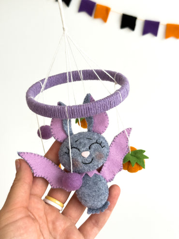 Felt Halloween mobile with flying bat and orange pumpkins
