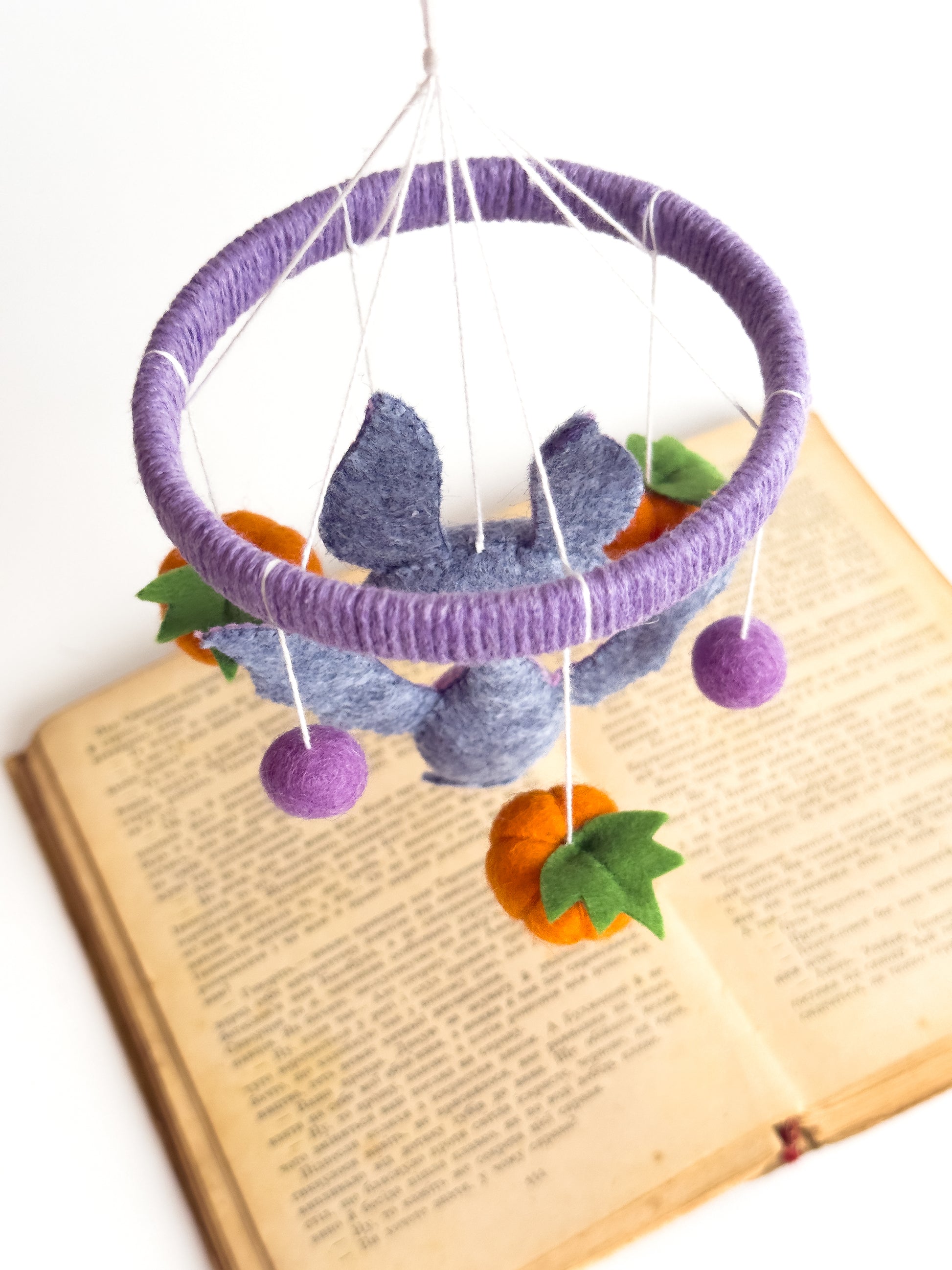 Halloween-themed baby mobile with gothic felt bat and bows