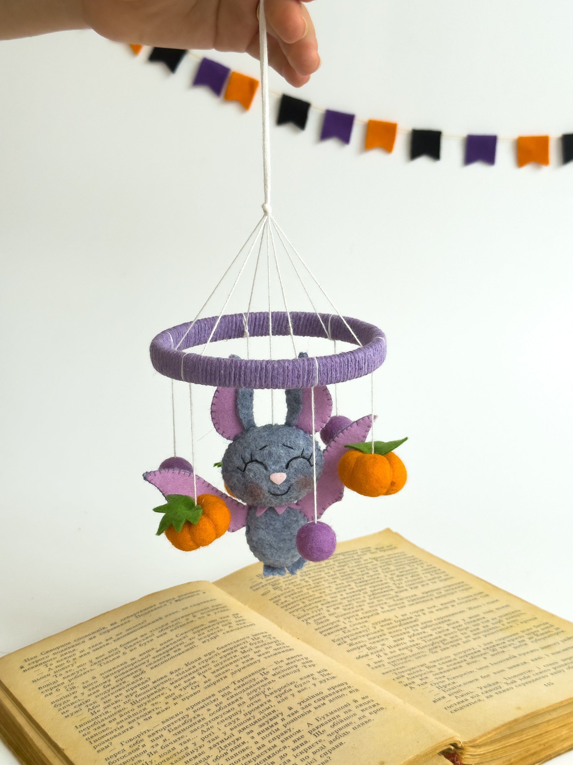 Spooky cute bat crib mobile decor in purple and orange