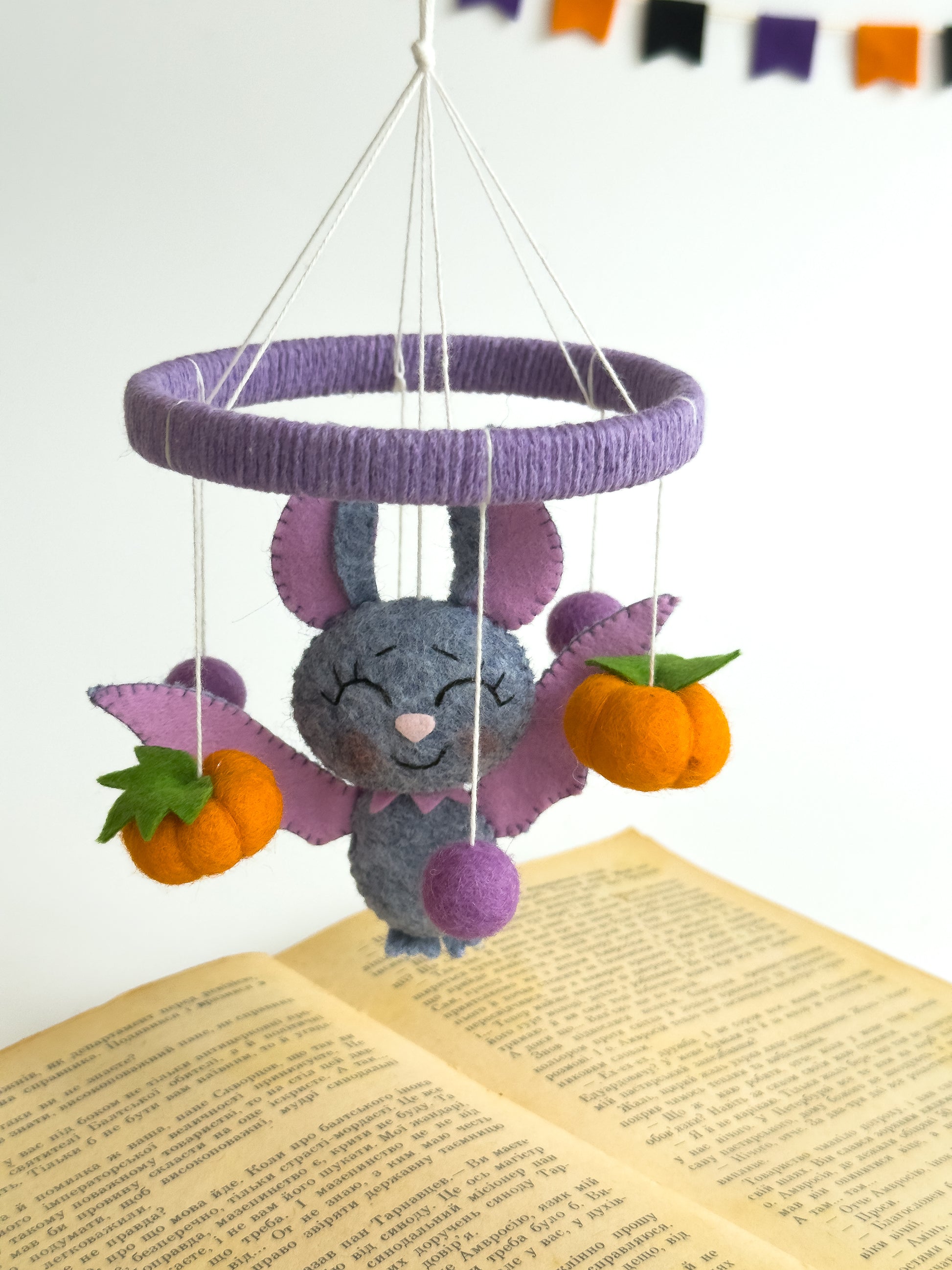 Felt Halloween mobile with flying bat and orange pumpkins