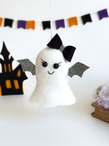 Handmade felt ghost ornament with silver glitter wings and bow
