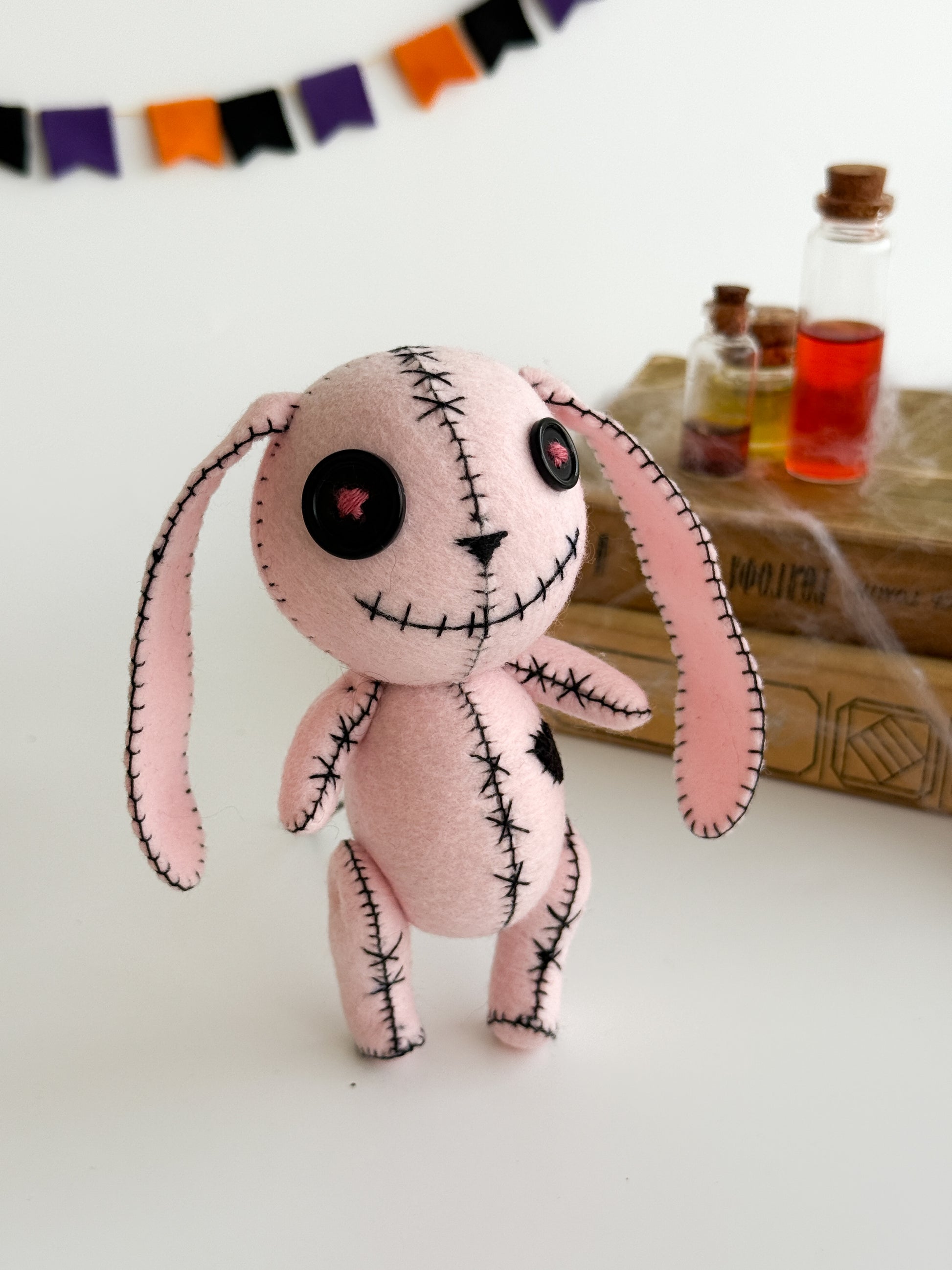 Handmade pink bunny plush with button eyes