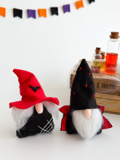 Handmade felt Halloween gnomes with colorful hats and natural wool beards