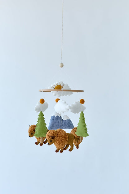 Buffalo Baby Mobile – Handmade Boucle Bison Crib Mobile with Trees, Mountains & Clouds - WoollyFox