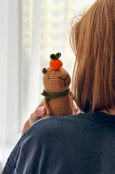 Crochet Capybara Toy with Orange and Scarf – Handmade Amigurumi Gift - WoollyFox
