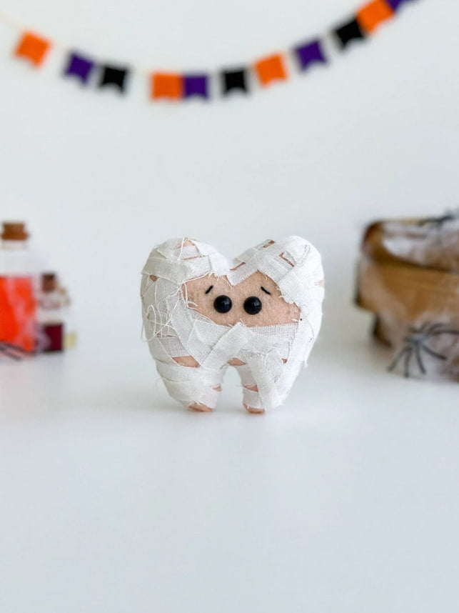 Cute tooth character Halloween ornament with stitches