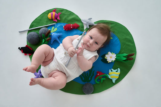 Toddler fish game with fishing pole