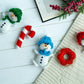Christmas snowmen in knitted hats
