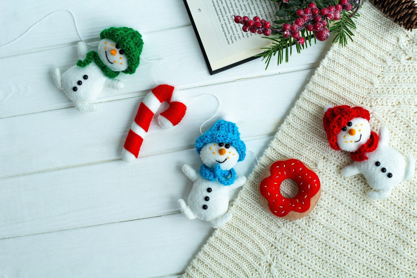 Christmas snowmen in knitted hats